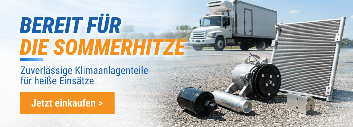FridayParts Klimaanlagenteile auf Asphalt vor einem LKW in der Sommerhitze.